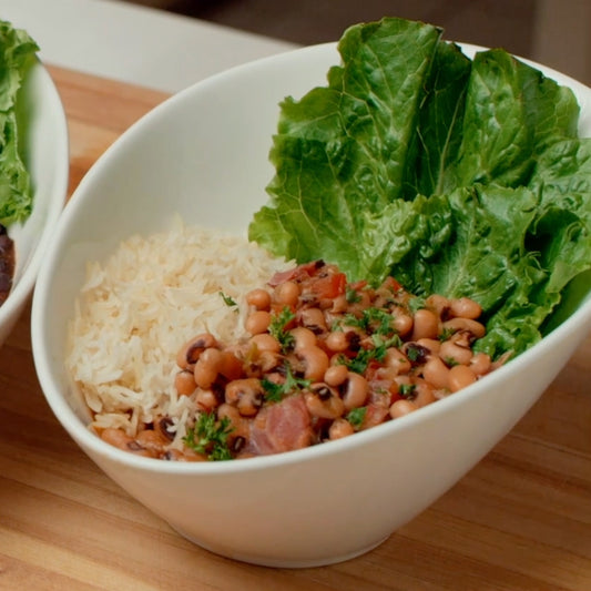 This hearty Creole-style Black-Eyed Peas and Ham Hocks recipe blends smoky ham, Creole spices, and tender beans to create a soulful dish